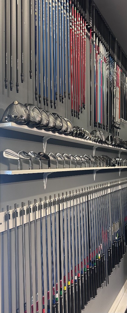 Full fitting wall with clubs and shafts