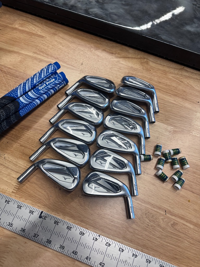 Custom club building workbench with Mizuno irons